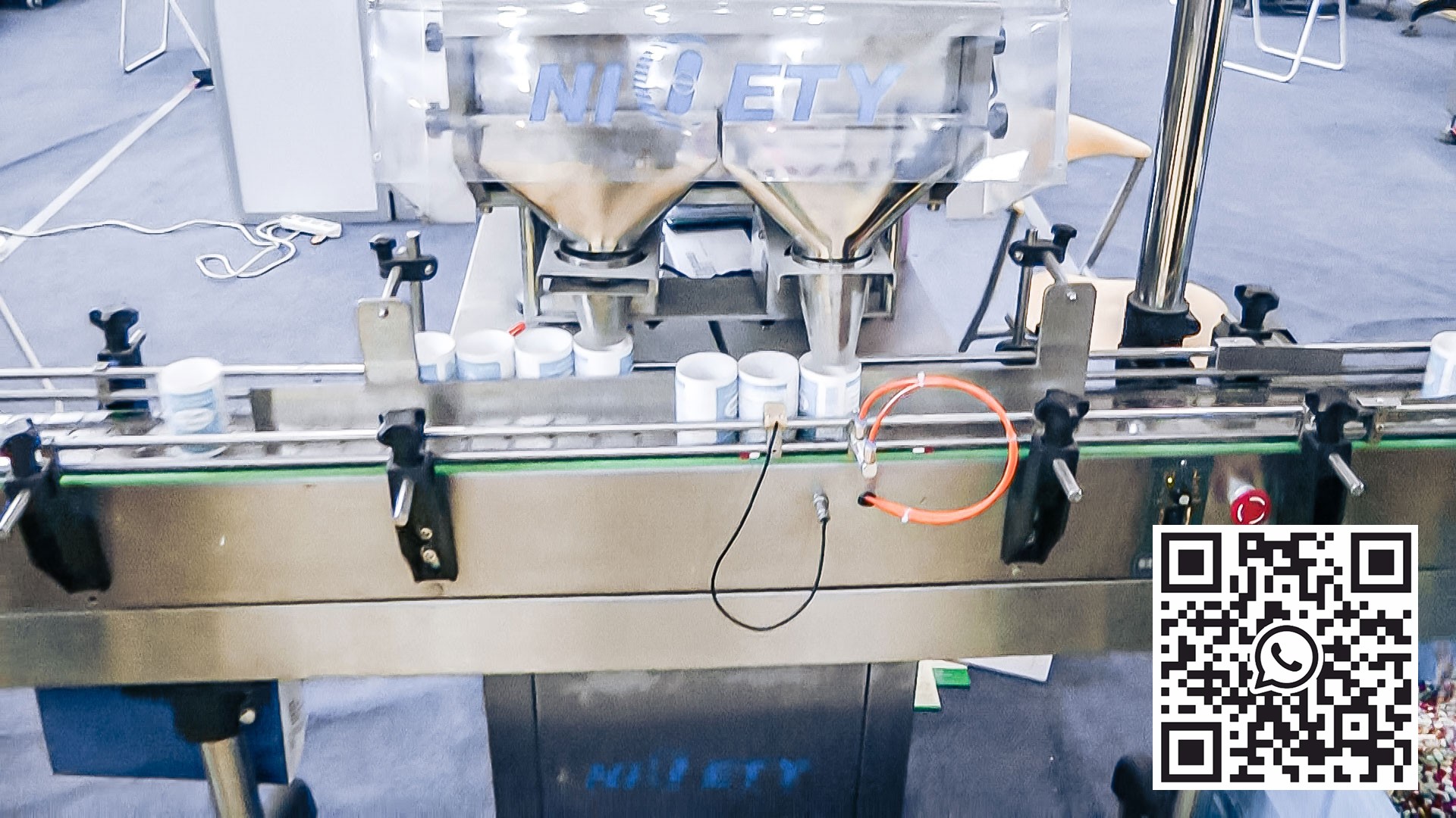 Outomatiese toerusting vir die vulling van gelatienkapsules in bottels vir farmaseutiese produksie