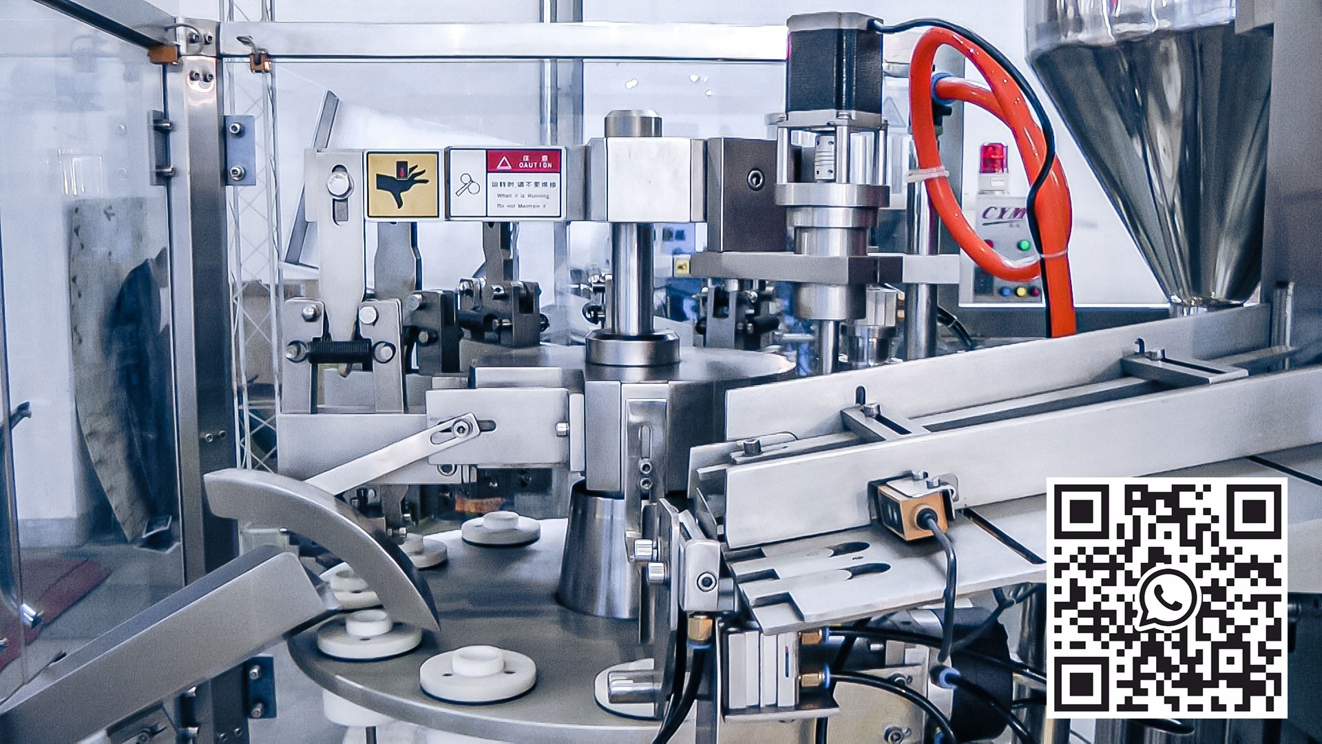 Automatinė tepalų užpildymo ir užplombavimo įranga plastikiniuose vamzdeliuose farmacijos gamyboje