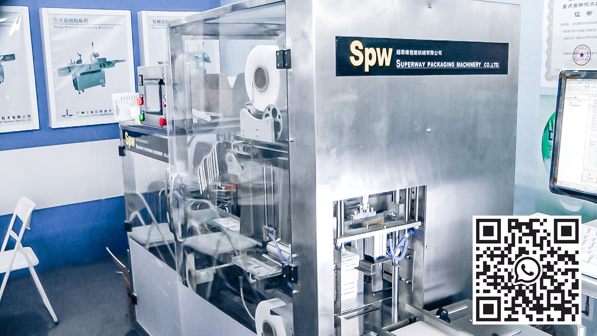 Automatinė pakavimo įranga - kartoninės dėžės celofano plėvelėje farmacijos gamyboje