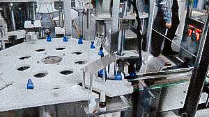Plastic bottle filling and capping line with screw caps for liquids