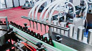 Automatic filling and capping machine for plastic medicine bottles