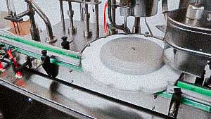 Automatic filling and closing line for penicillin bottles, rubber stoppers and aluminum caps USA