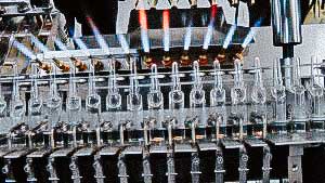 Automatic filling and sealing machine for glass ampoules with pharmaceutical drugs