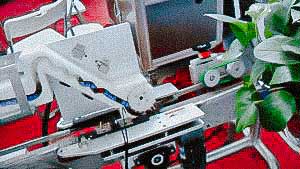 Automatic labeling equipment for labelling self-adhesive labels on glass ampoules and vials