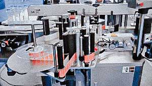 Automatic labeling machine for sticking labels on square bottles on both sides