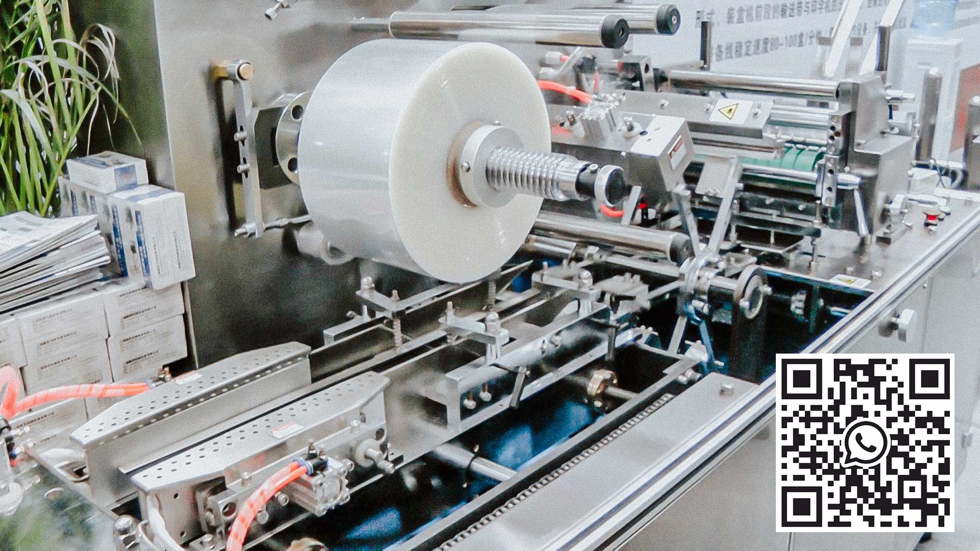 Automatic packaging in cellophane wrap cardboard boxes with medicine