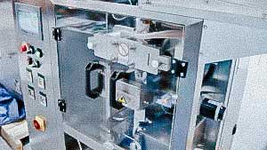 Automatic packaging machine for packing powder into sachet bags