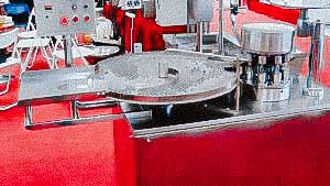 Automatic penicillin bottle filling and capping machine with aluminum caps