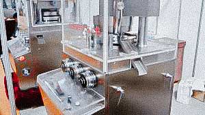 Automatic rotary tablet press for production of tablets with oval shape