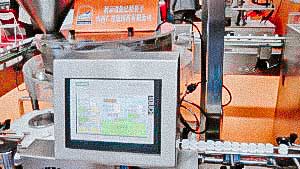 Automatic tablet filling line and plastic bottles and cap closure