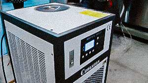 Pharmaceutical cooler to work with various packaging equipment
