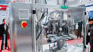 Pharmaceutical equipment for filling and sealing plastic tubes with cream and ointment