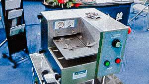 Pharmaceutical equipment for removing tablets and capsules from ready-made blisters