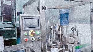 Powder dosage and filling equipment in metal cans with capping metal lid