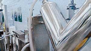 V Mixer for powder mixing and unloading to a vacuum conveyor