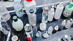 Various samples of glass and plastic bottles for filling in and plugging