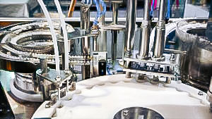 Automatic equipment for filling and closing of penicillin bottles aluminum caps