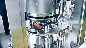Automatic equipment for production of oval tablets in pharmaceutical production