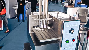 Automatic equipment for removal of gelatin capsules from blisters in pharmaceutical production