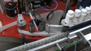 Automatic labeling equipment on penicillin vials in pharmaceutical production